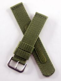 21 mm green military style webbing strap with brushed stainless steel pin buckle.